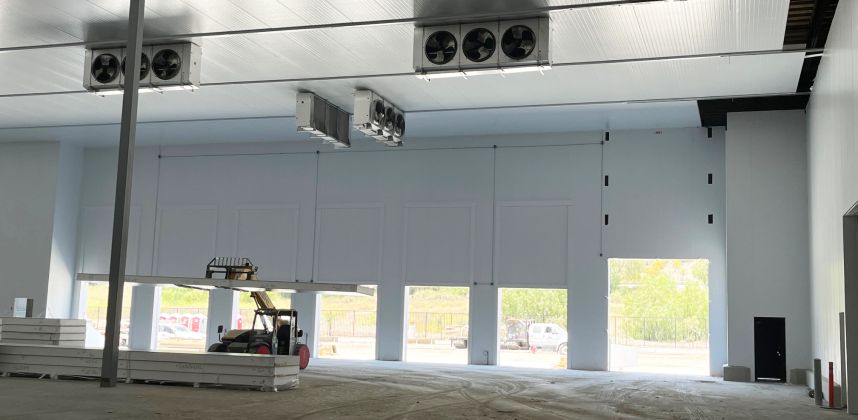 Distribution warehouse with freezer, cooler, and shipping dock