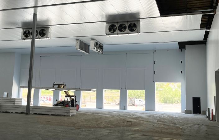 Distribution warehouse with freezer, cooler, and shipping dock